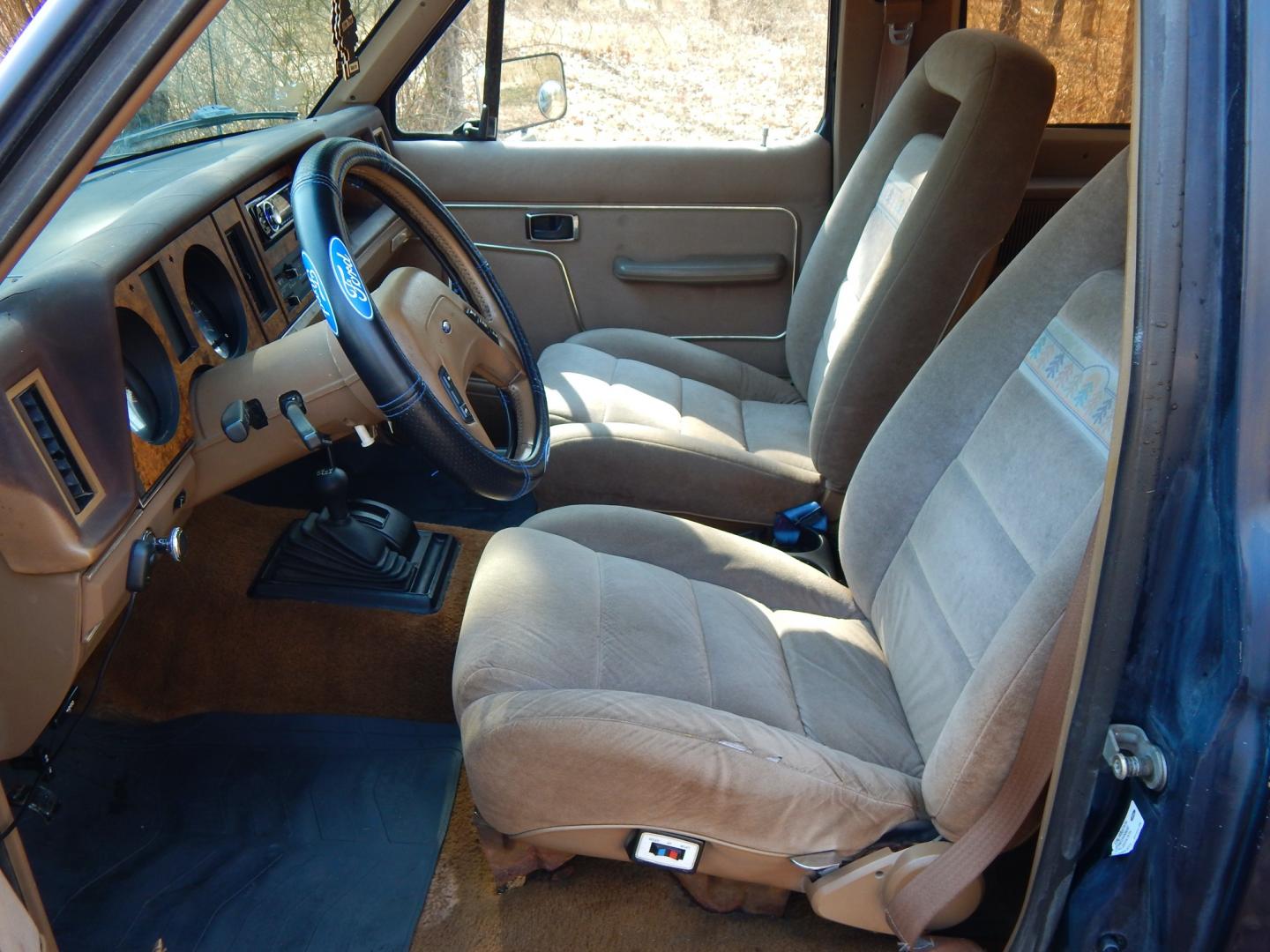 1988 Blue /Tan Ford Bronco II 4WD (1FMCU14T6JU) with an 2.9L V6 OHV 12V engine, 4-Speed Automatic Overdrive transmission, located at 6528 Lower York Road, New Hope, PA, 18938, (215) 862-9555, 40.358707, -74.977882 - Here we have a 1988 Ford Bronco 2 with a 2.9L V6 putting power to a 4x4 automatic transmission. Options include: tan cloth interior, heat/AC, XD Vision radio, power windows, cruise control, tilt steering wheel, front/rear defrost windows, spare tire cover, 15 inch alloy wheels with 4 Solarus AP tire - Photo#8